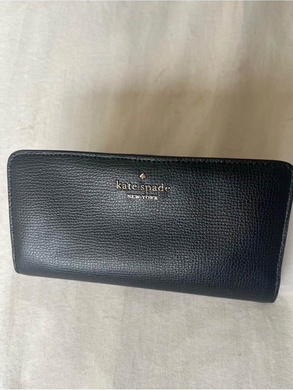 kate spade Black Pebbled Leather Zip-Around Wallet with Gold Logo
